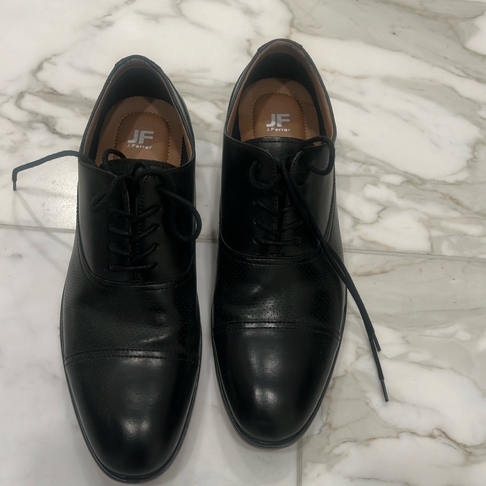 J Ferrar size 10 men’s shoes. Black with brown sole.